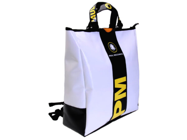 2 IN 1 BRIEFCASE AND BACKPACK IN BLACK WHITE YELLOW. MODEL HYBRID MADE OF LORRY TARPAULIN.