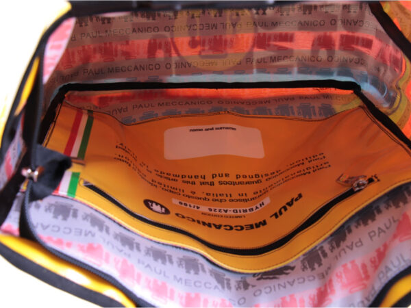 2 IN 1 BRIEFCASE AND BACKPACK IN BLACK WHITE YELLOW. MODEL HYBRID MADE OF LORRY TARPAULIN.