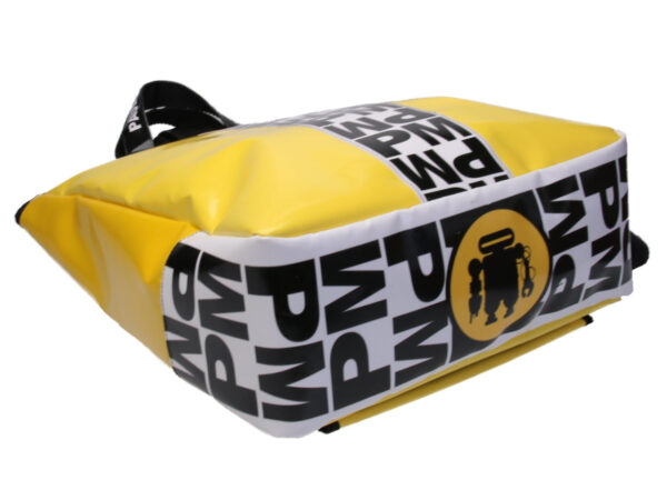 2 IN 1 BRIEFCASE AND BACKPACK IN YELLOW WITH BLACK AND WHITE LETTERING. MODEL HYBRID MADE OF LORRY TARPAULIN.