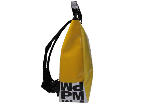 2 IN 1 BRIEFCASE AND BACKPACK IN YELLOW WITH BLACK AND WHITE LETTERING. MODEL HYBRID MADE OF LORRY TARPAULIN.
