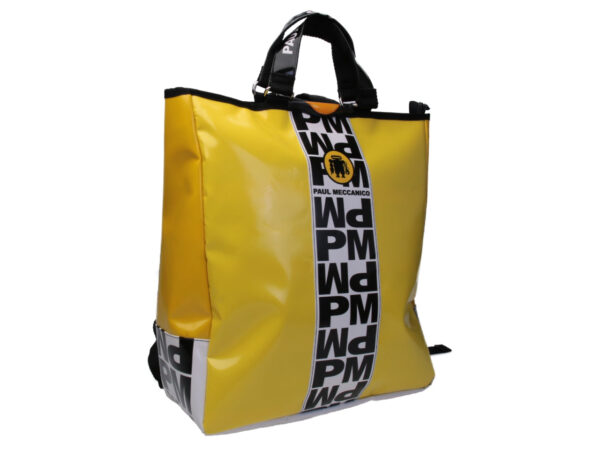 2 IN 1 BRIEFCASE AND BACKPACK IN YELLOW WITH BLACK AND WHITE LETTERING. MODEL HYBRID MADE OF LORRY TARPAULIN.
